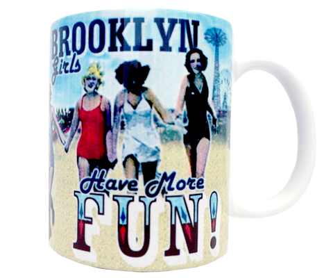 11oz white ceramic mug featuring hand-drawn “Brooklyn Girls Have More Fun” design. Dishwasher & microwave safe, playful Brooklyn-inspired coffee mug.