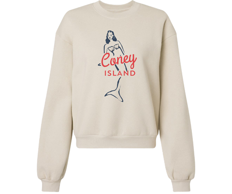 Light cream ladies sweatshirt featuring vintage style surfer mermaid graphic inspired by Coney Island, designed by Brooklyn artist Lola Star.