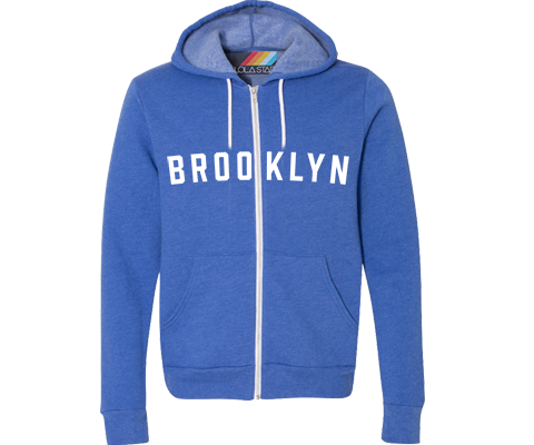 Medium blue Brooklyn zip-up sweatshirt featuring vintage white lettering, hood and front pockets with a relaxed classic fit.