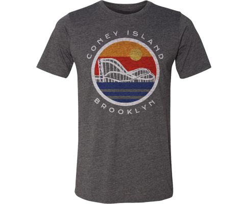 Hand-designed Coney Island Globe tee featuring the Cyclone roller coaster riding into a retro sunset. Surf-inspired vibes. Printed in Brooklyn.